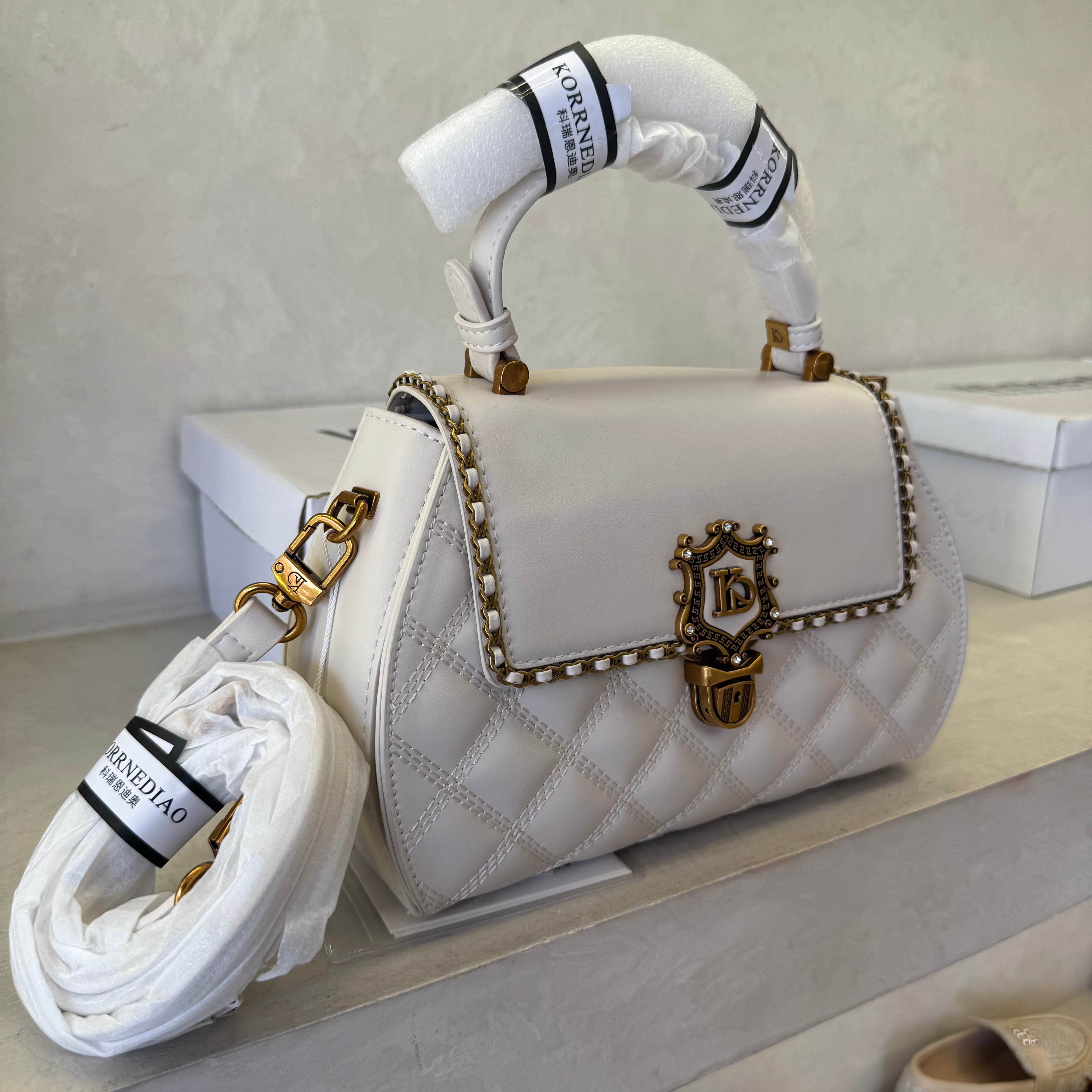 Vintage Emblem Quilted Crossbody Bag