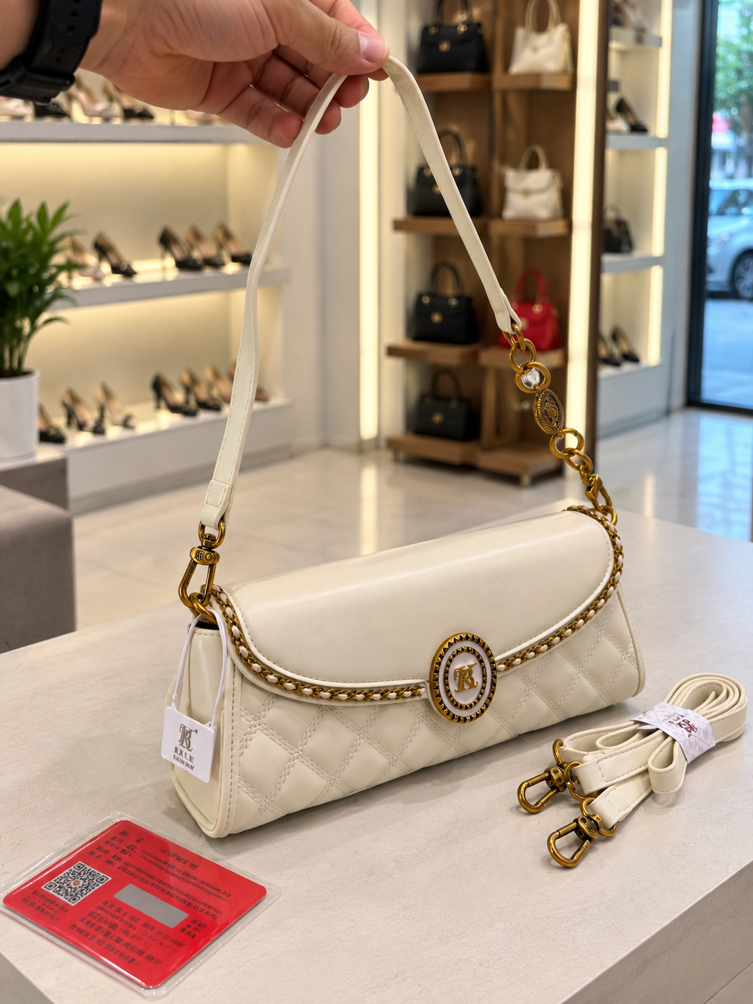 Quilted Baguette Bag with Round Buckle